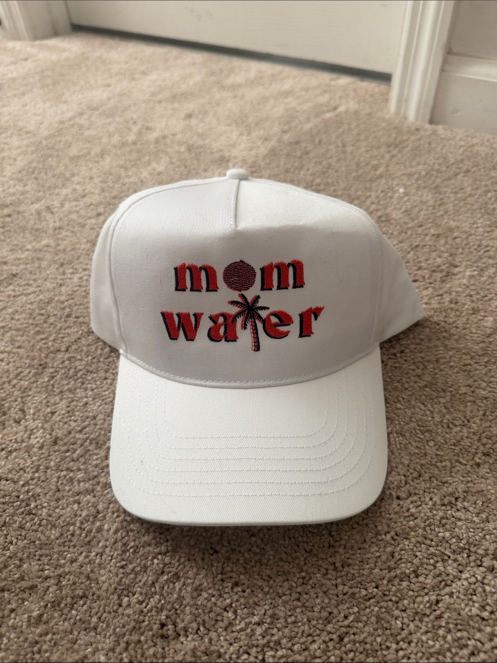 White Baseball Cap with Red & Black "mom water" Embroidery